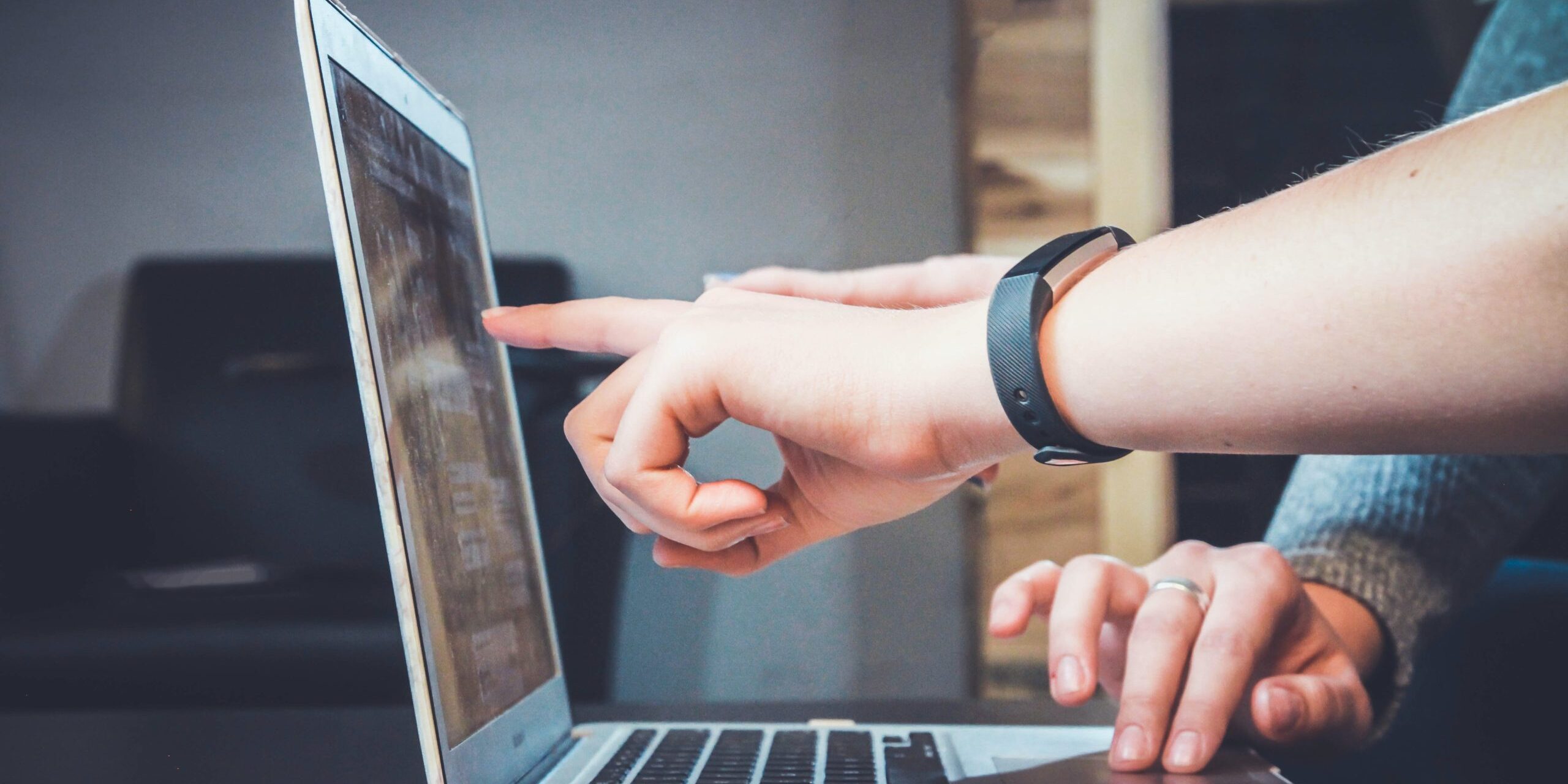 5-Things-You-Should-Never-Do-on-a-Work-image-scaled.jpg person using laptop