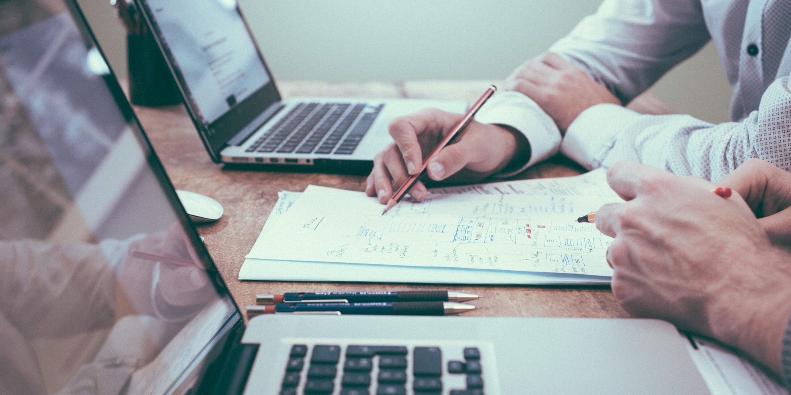 TTT_6-Important-IT-Policies-Any-Size-Company-Should-Implement-Featured-Image-scaled.jpg person holding pencil near laptop computer