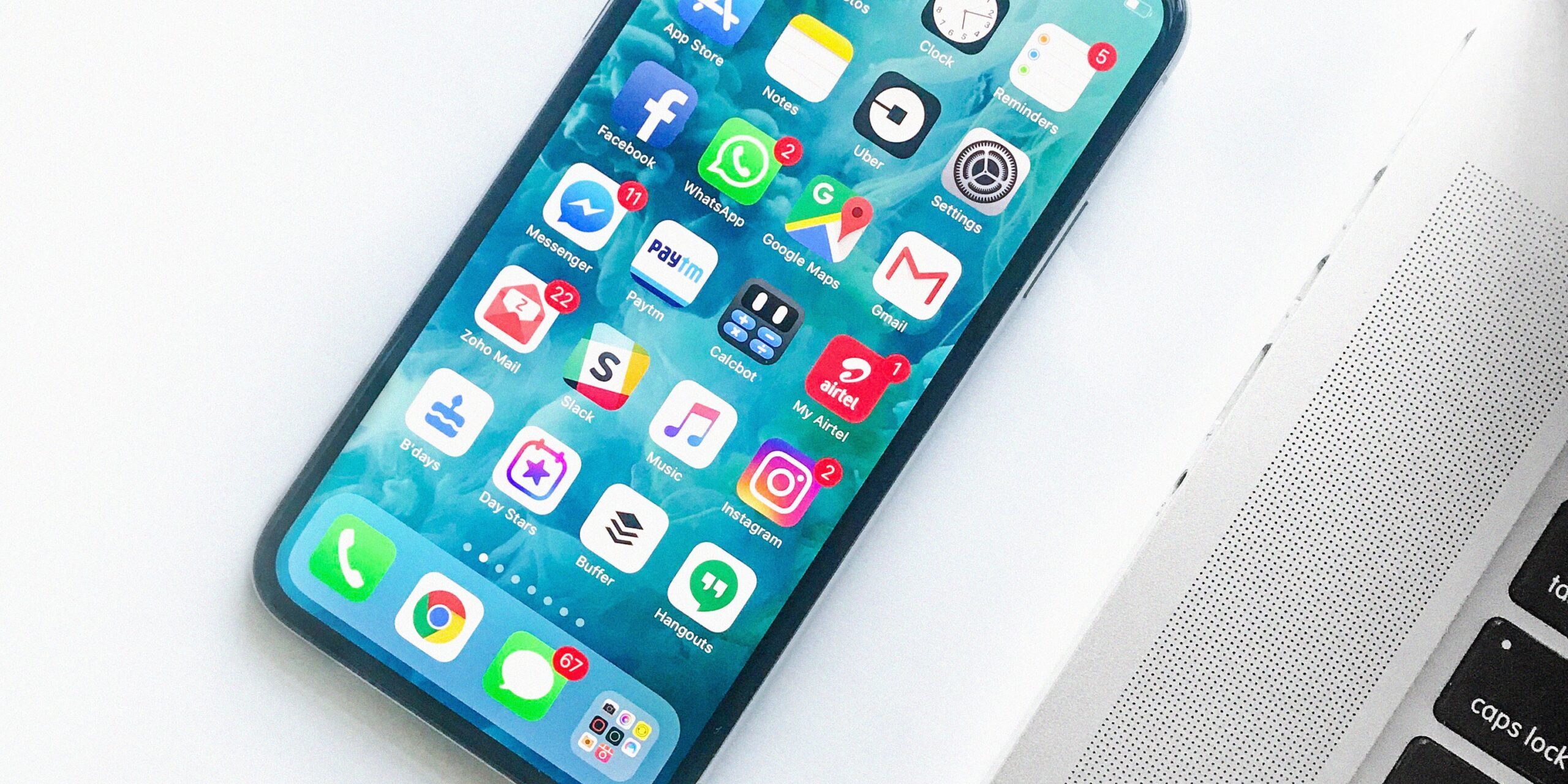 7-Most-Exciting-App-Announcements-at-Microsoft-Ignite-2022-scaled.jpg white smartphone near laptop