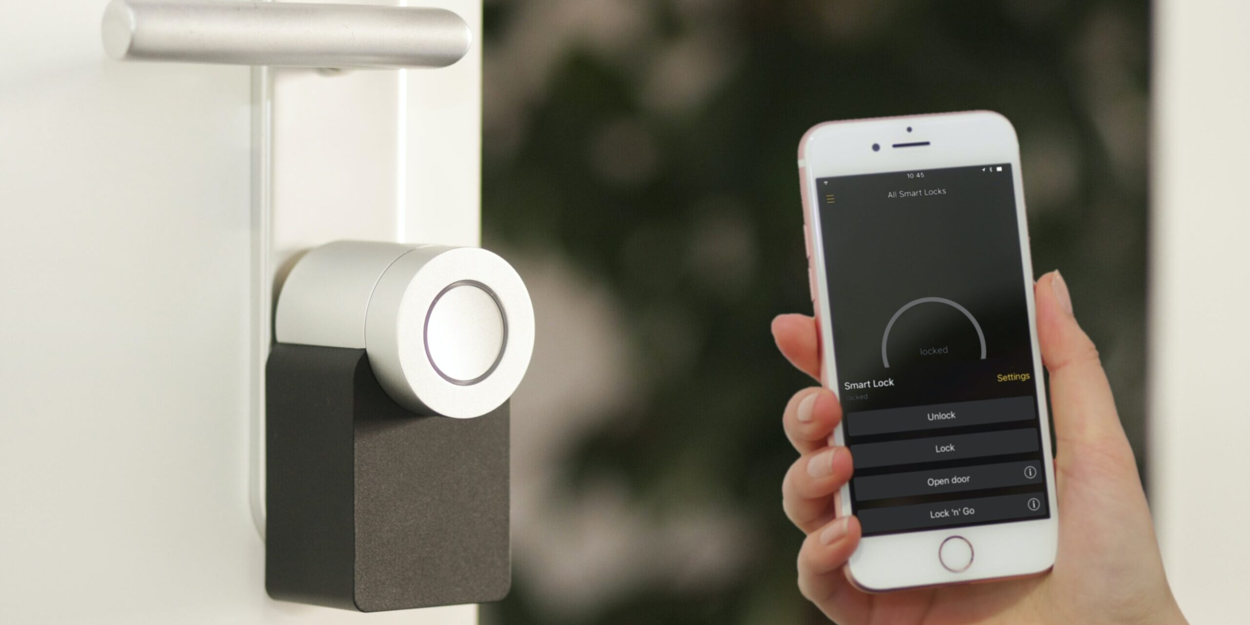Dont-Set-Yourself-Up-to-Fail-Tips-for-Safer-Home-Security-Setups-scaled.jpg gold Apple iPhone smartphone held at the door