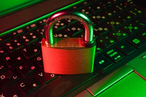6-Steps-to-Effective-Vulnerability-Management-for-Your-Technology-Featured-Image-scaled.jpg red padlock on black computer keyboard