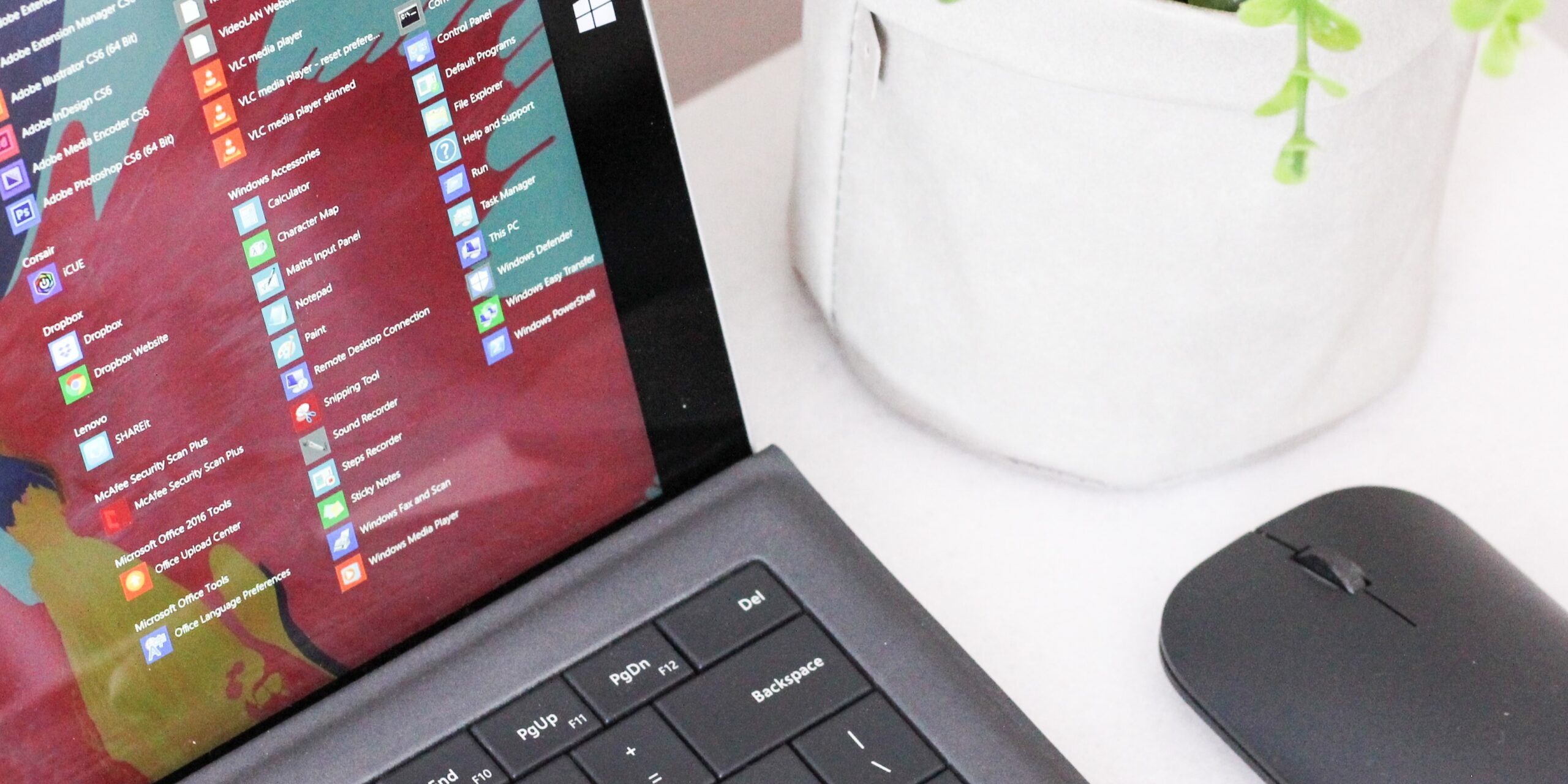 Microsoft-Forms-Featured-Image-scaled.jpg black laptop computer beside black wireless mouse