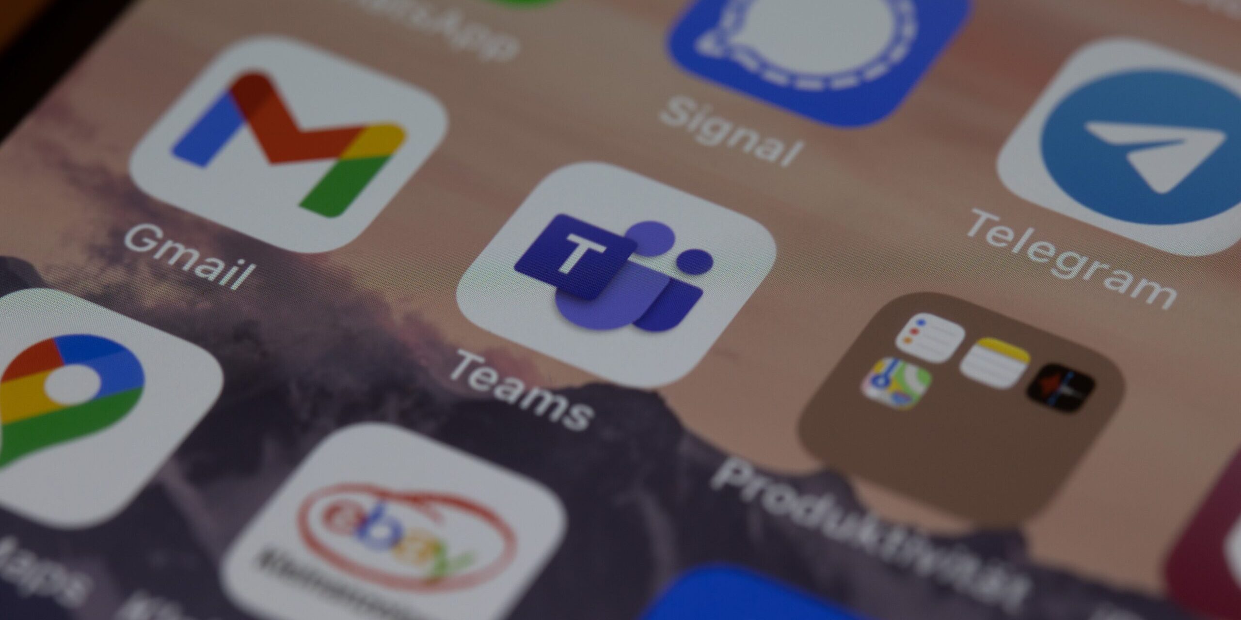How-Can-You-Leverage-the-New-MS-Teams-Payment-App_-scaled.jpg iphone screen with icons on screen