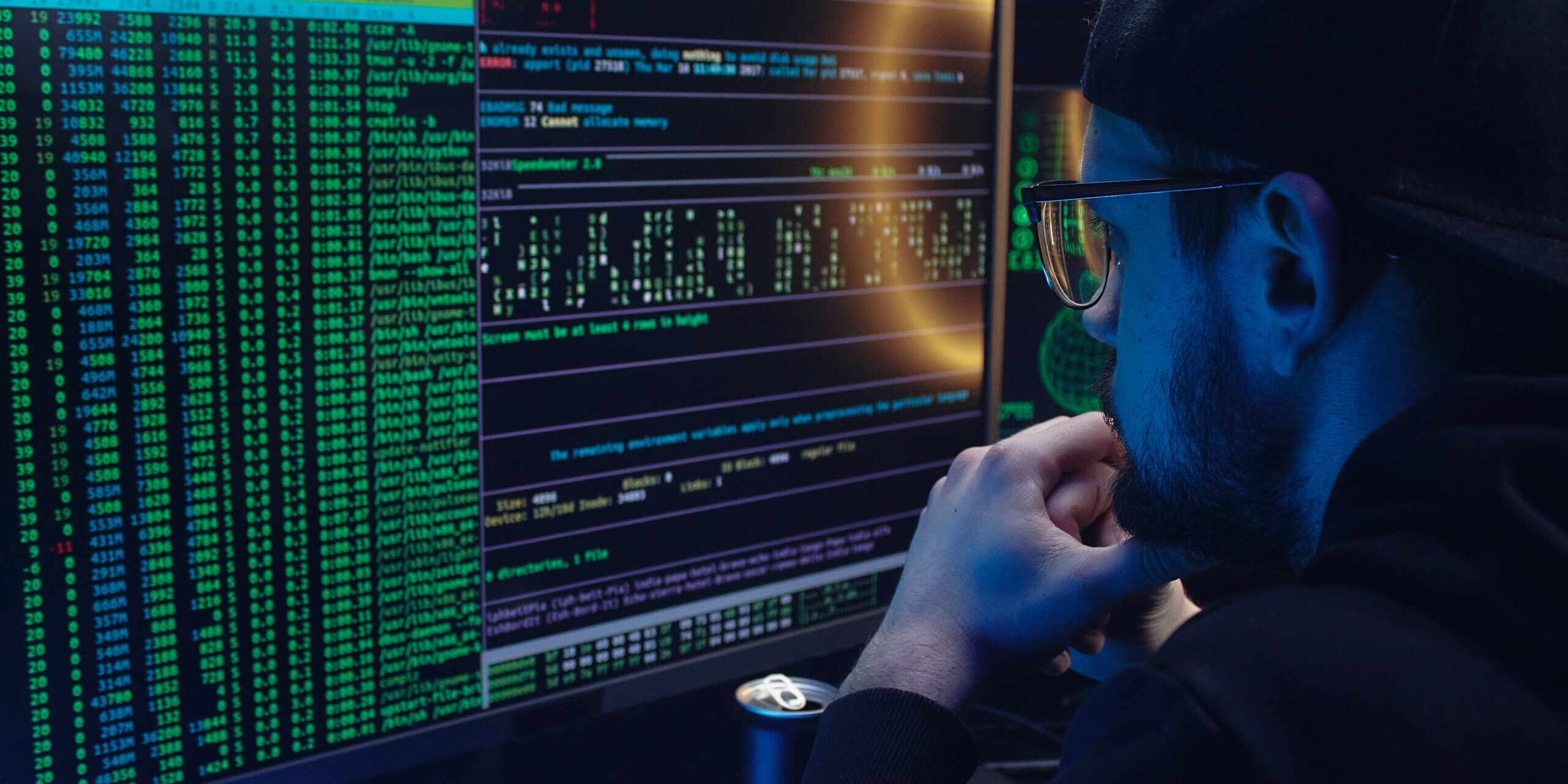 Top-Data-Breaches-of-2023-Numbers-Hit-an-All-Time-High-scaled.jpg Free A Man Looking at a Computer Screen with Data Stock Photo