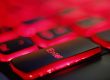a close up of a red and black keyboard